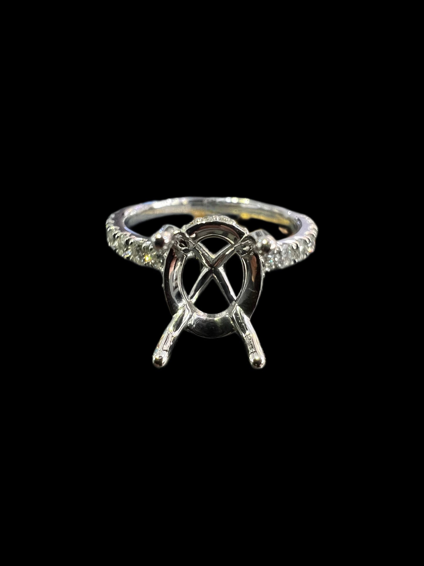 Oval Under Halo Diamond Setting